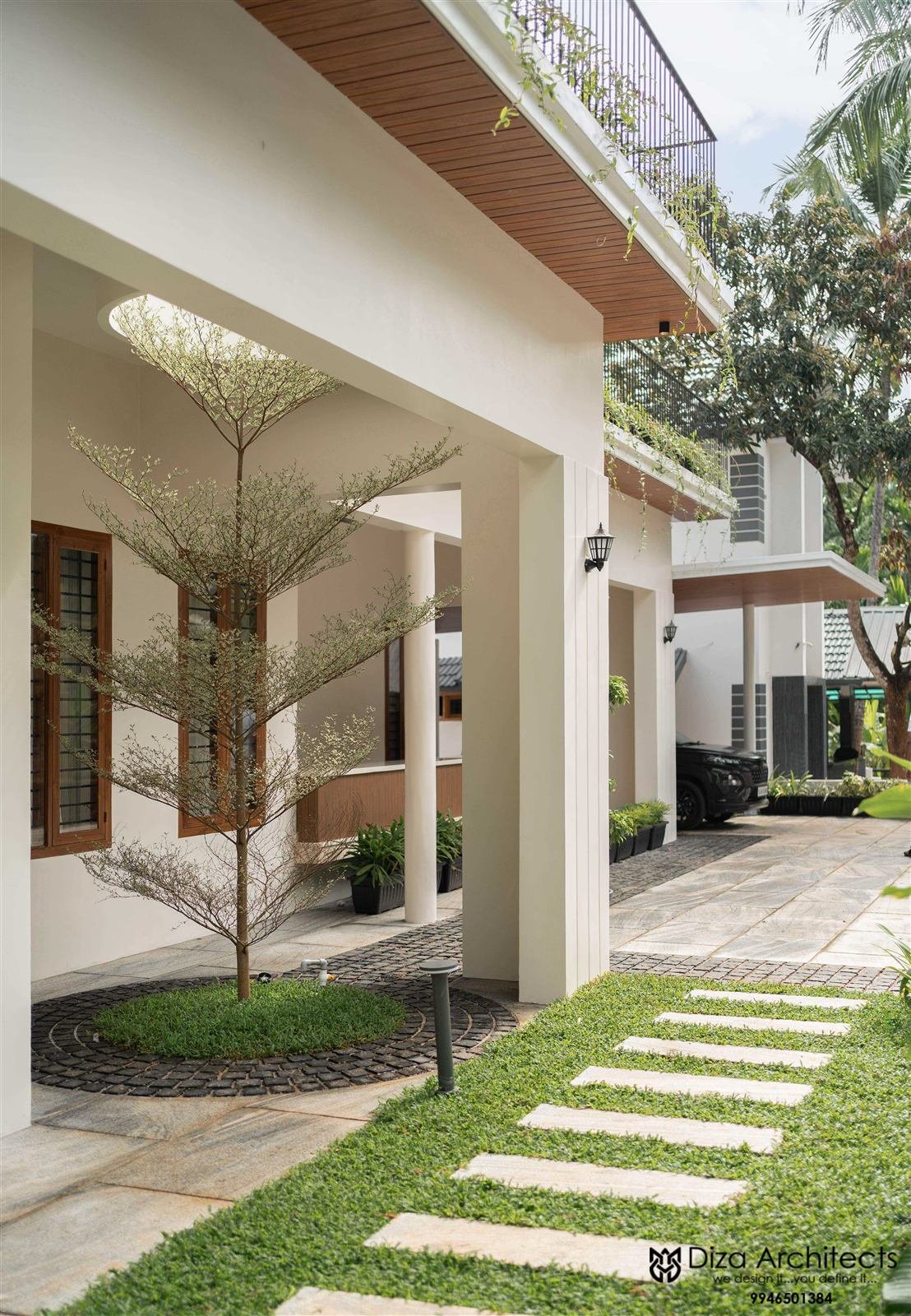 A DIZA-designed residence rising above the greenery